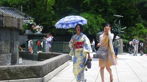 girl wearing yukata with umbrella