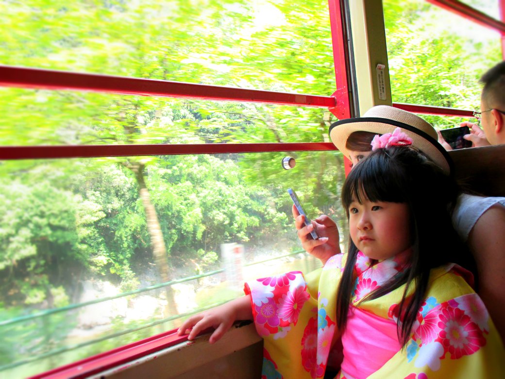 cute japanese girl on sagano scenic train